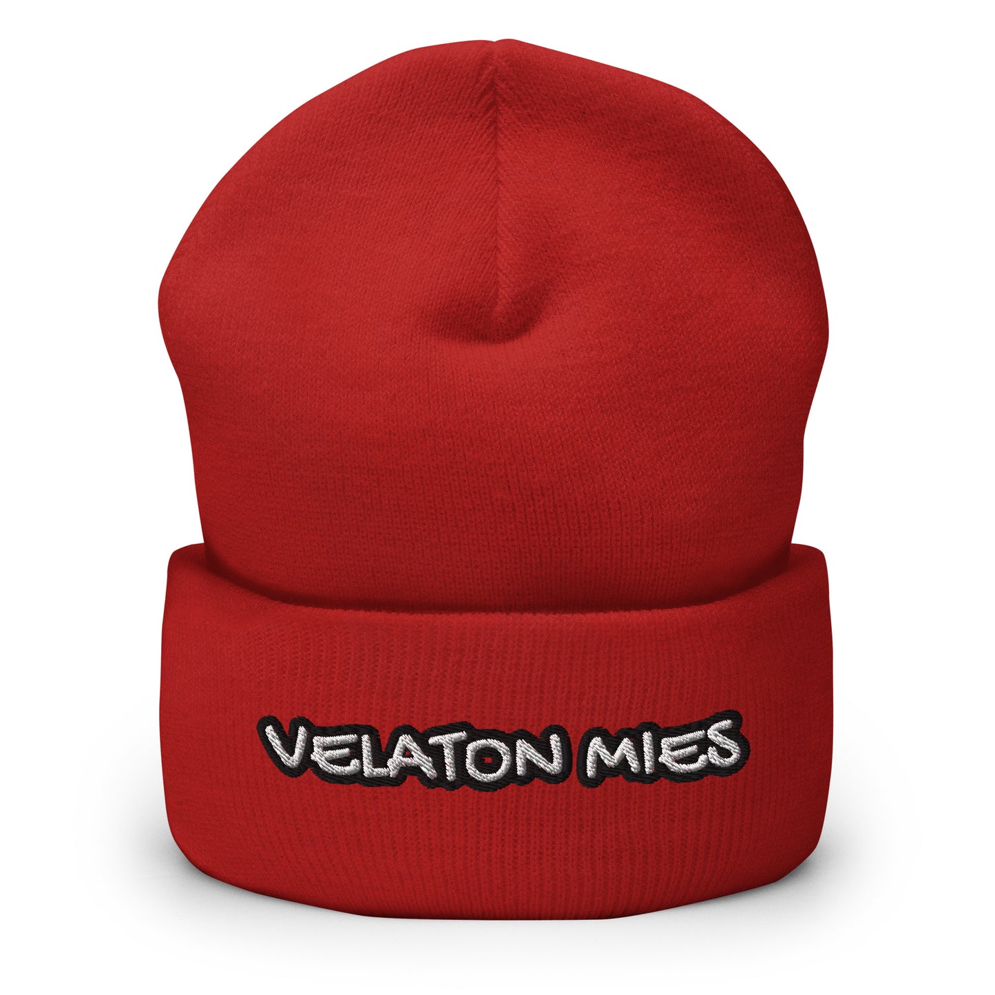 Meemirottan Velaton Mies Pipo on lihavoitu punainen taitettu reunus pipo, jossa on kirjailtu teksti "VELATON MIES" lihavoituin, leikkisillä valkoisilla kirjaimilla, jotka on rajattu mustalla ääriviivalla - ihanteellinen lahjaidea meemivaatteiden ystäville.
