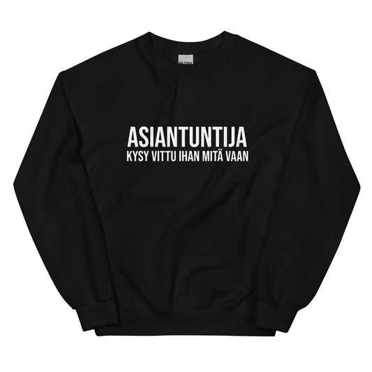 Mustassa collegepaidassa teksti ASIANTUNTIJA kysy vittu ihan mitä vaan, Meemirotta-merkillä