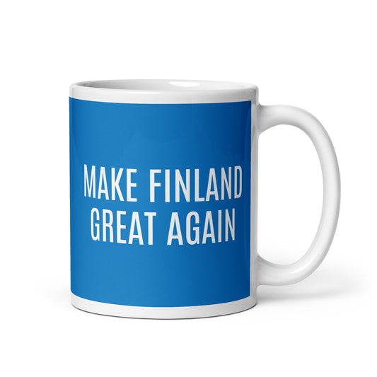 Hauska kahvikuppi, jossa on sininen tausta ja teksti 'MAKE FINLAND GREAT AGAIN'