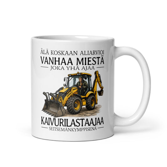 Hauska kahvikuppi työpaikalle, jossa on kaivurilla ajava hahmo ja huvittava teksti.