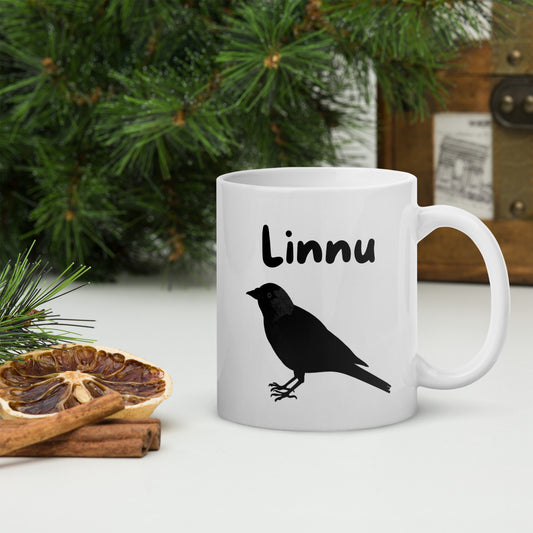 Hauska kahvikuppi työpaikalle, jossa on musta linnun siluetti ja teksti 'Linnu'