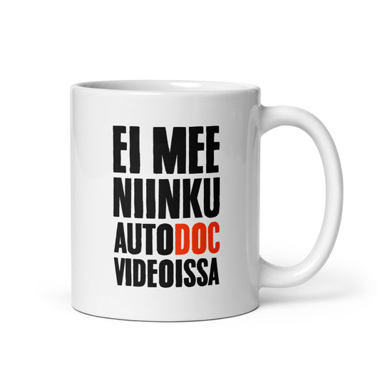 Hauska muki lahjaksi valkoisella taustalla, jossa leikillinen teksti EI MEE NIINKU AUTODOC VIDEOISSA