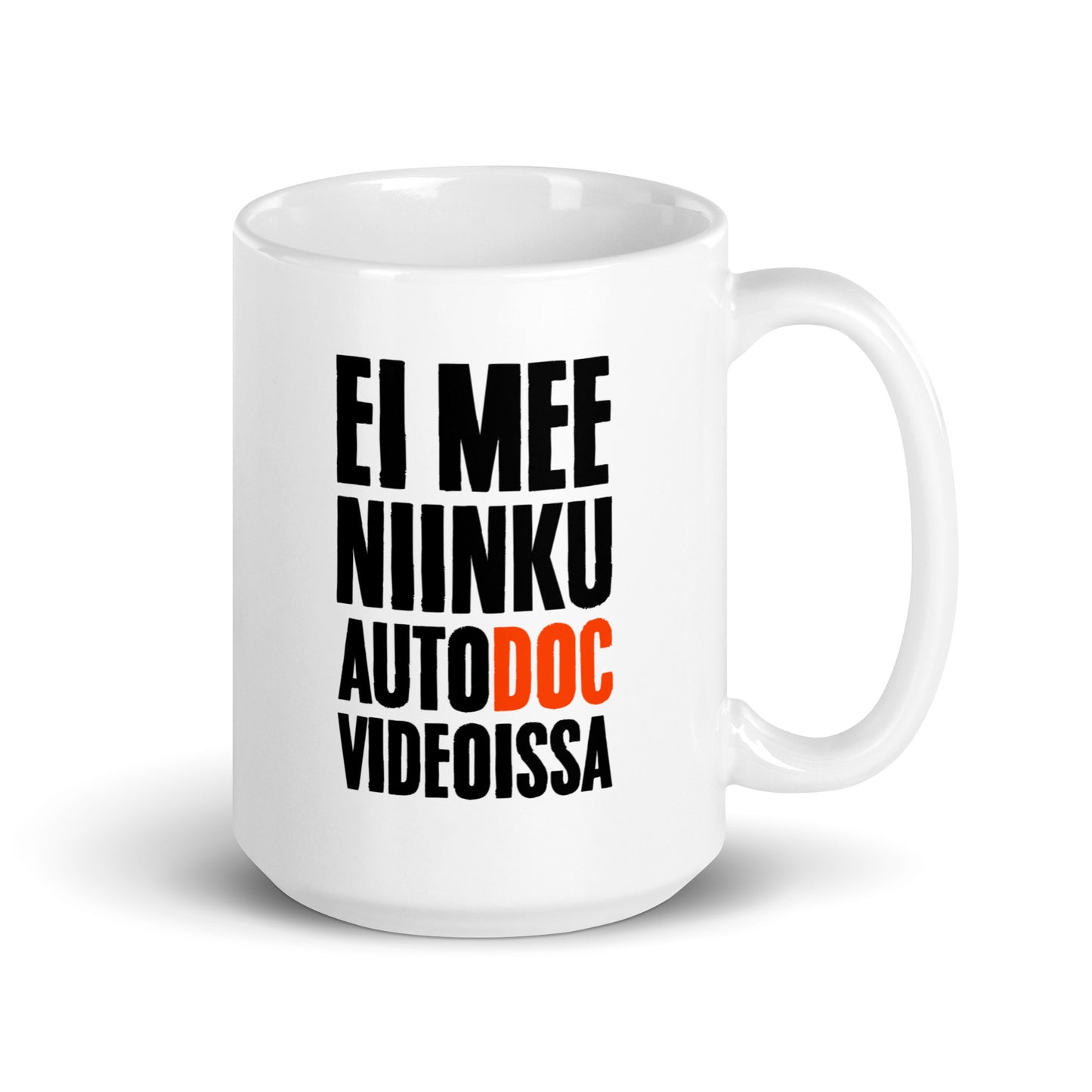 Hauska muki lahjaksi, jossa teksti 'Ei mee niinku autodoc videoissa' valkoisella pohjalla.