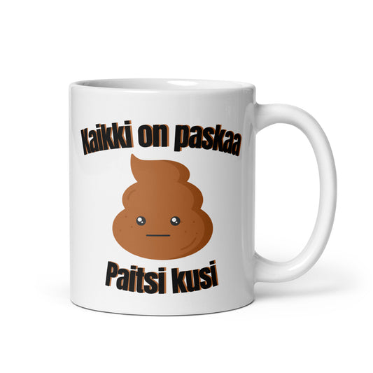 Hauska muki lahjaksi, jossa hauska teksti 'Kaikki on paskaa, paitsi kusi'.