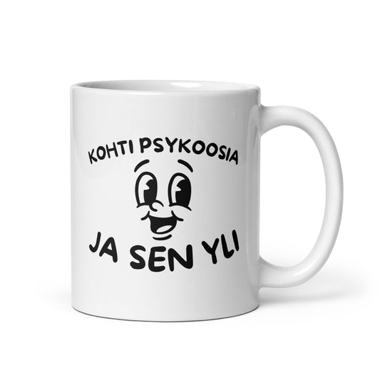 Hauska muki lahjaksi, jossa hymyilevä naama ja teksti Kohti psykoosia ja sen yli