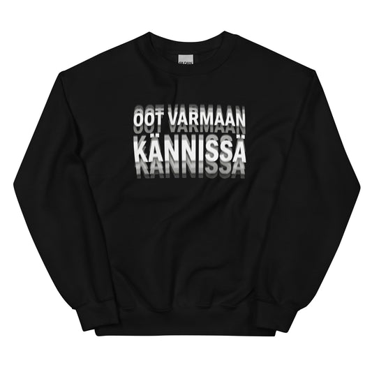 Musta tekstipaita, jossa on rohkea painatus 'OOT VARMAAN KÄNNISSÄ' edessä