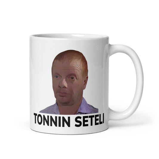 Meemirotta tonnin seteli muki, jossa kuva ja teksti tonnin seteli selkeällä taustalla